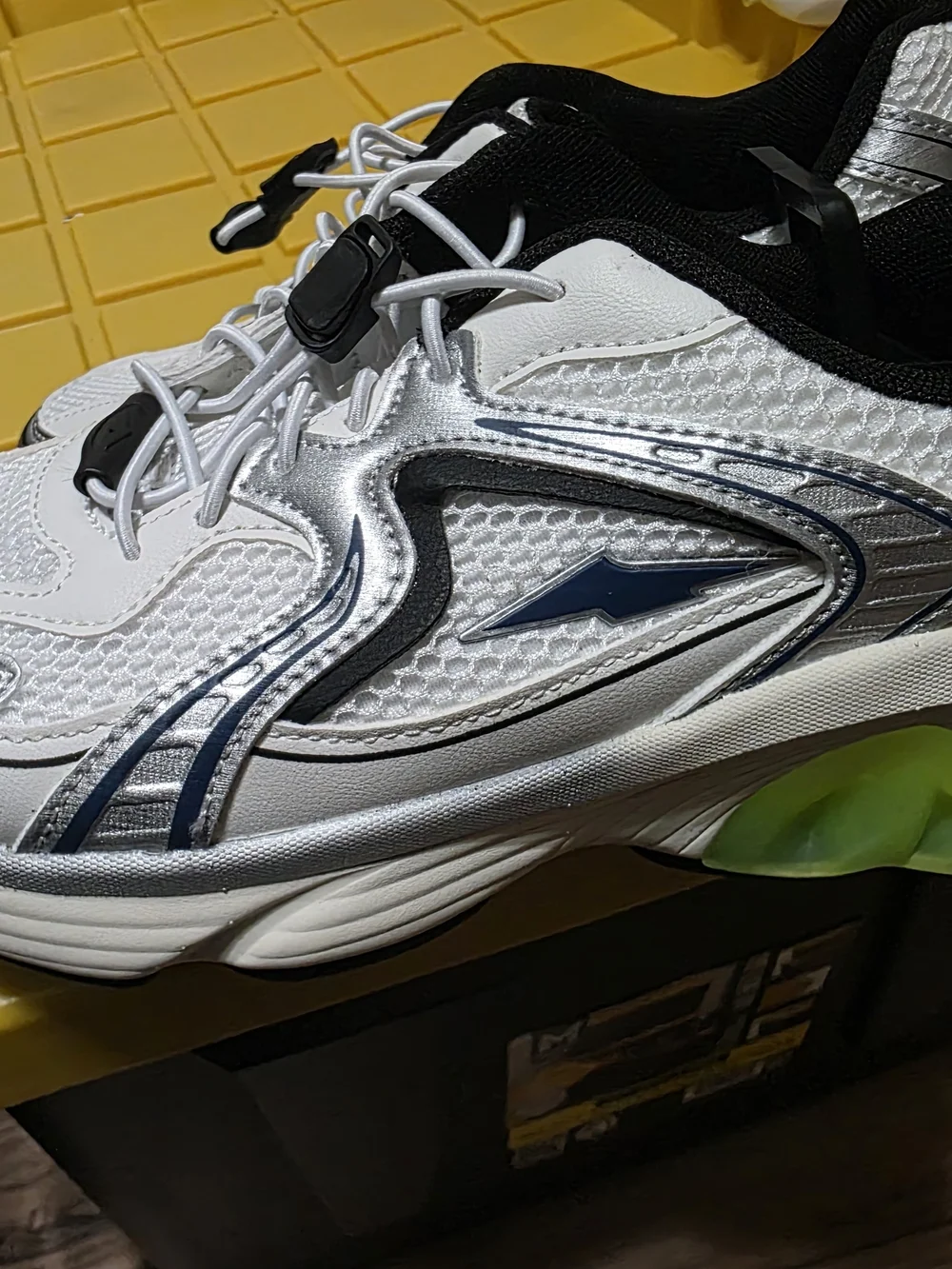 Avia White and Black Athletic Sneakers with Blue Accents